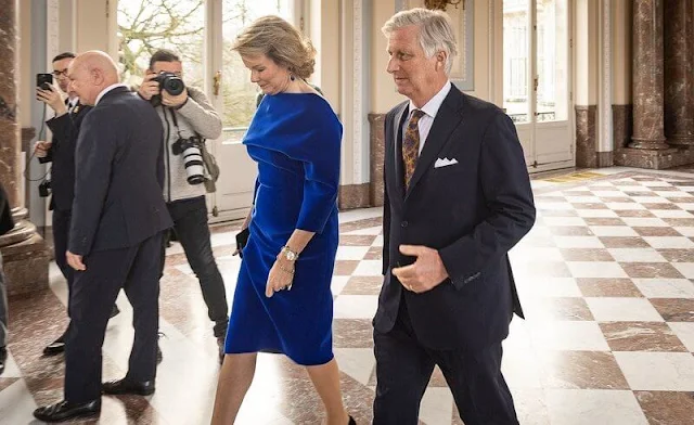 Queen Mathilde wore a royal blue velvet flexible scuba dress by Natan for the European institutions meeting