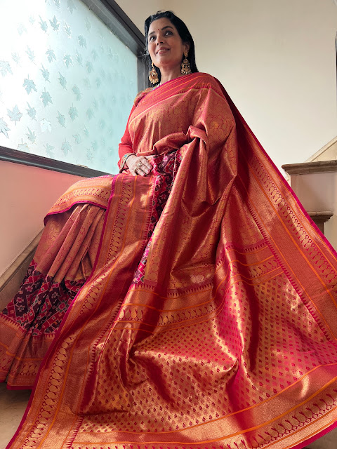 Rose gold silk Kanjeewaram saree with a patola border