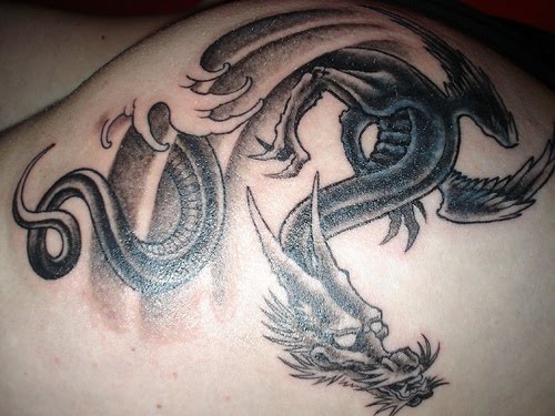 Black Dragon Tattoo Design. Posted by prison tattoos