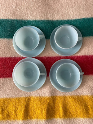 Four fire-king cups and saucers in Turquoise blue