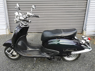 Side view of Honda Joker Replica electric scooter