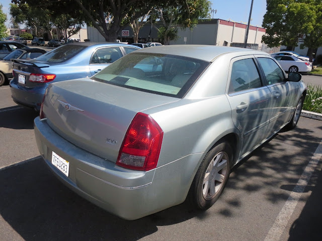 Automobile refinish from silver to black.