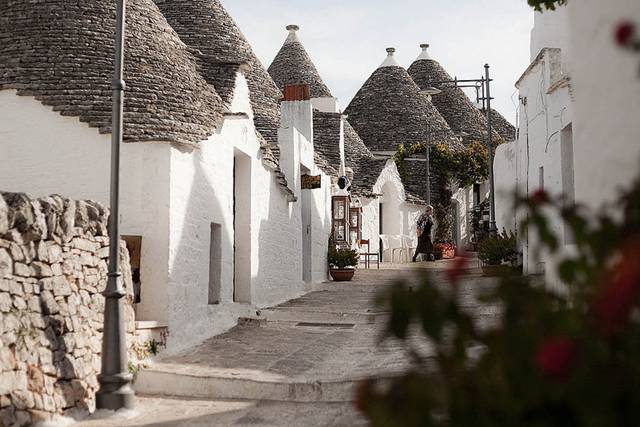 Alberobello, the city of drystone dwellings known as trulli , is an exceptional example of vernacular architecture. It is one of the best preserved and most homogeneous urban areas of this type in Europe. Its special features, and the fact that the buildings are still occupied, make it unique. It also represents a remarkable survival of prehistoric building techniques.