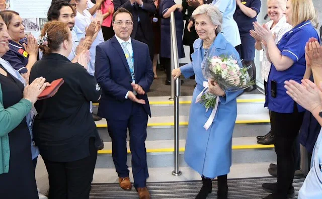 The Duchess of Gloucester wore a sky blue wool midi coat by Max Mara. The Duchess visited the Rainbow Suite