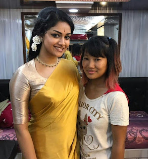 Keerthy Suresh with a Fan