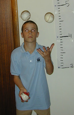 Tanner juggling for a Science Fair experiment in May, 2000