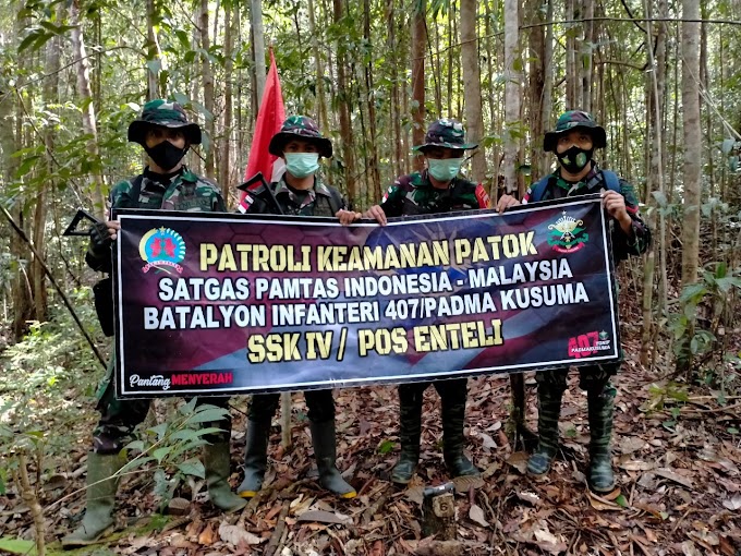 Pastikan Batas Wilayah Negara, Satgas Pamtas Yonif 407/PK Laksanakan Patroli Patok.