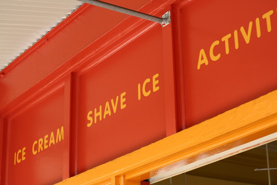 Red and yellow building and lettering in Lahaina