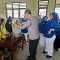 Dukung Program Pemerintah, Kapolsek Hinai Berikan Bubur Kacang Hijau Gratis kepada Pelajar SD Negeri 057213 Cempa