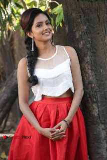 Actress Mahima Nambiar Latest Stills in White Top and Red Skirt at Kuttram 23 Movie Press Meet  0016.jpg
