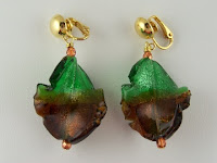 http://www.thecliponearringstore.com/green-and-amber-leaf-twist-clip-on-earrings.html