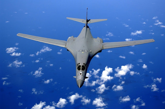 A B-1B Lancer soars over the Pacific Ocean as it maneuvers in for aerial refueling by a KC-135 Stratotanker on September 30, 2005. Wikimedia Commons/U.S. Air Force