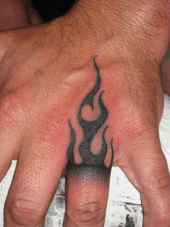 Tribal Flame hand tattoos