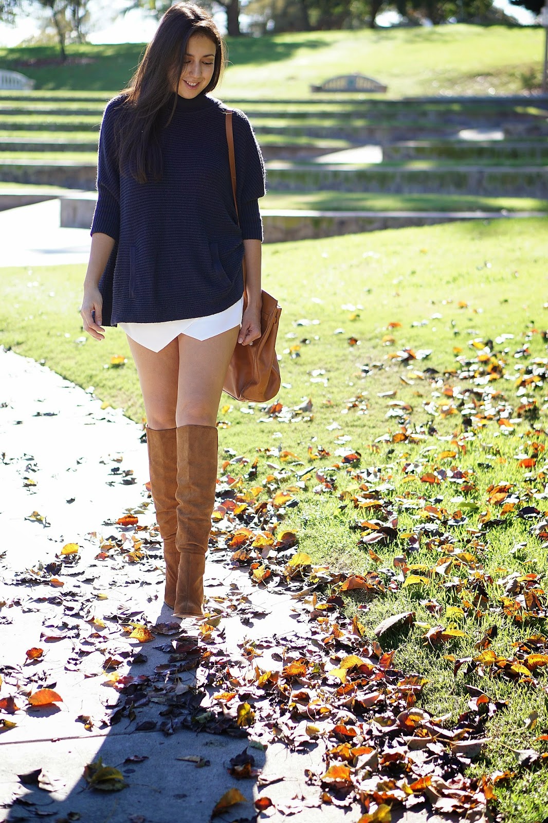 Zara High Heeled Leather Boot, Zara Camel Colored Knee High Boot, Light Brown Boots, Forever 21 White Skort, White Skort, Hermes Inspired Bag, Oversized Navy Sweater, H&M Navy Sweater, How To Wear Knee High Boots With A Skirt