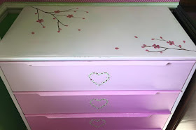 The oriental blossom looks beautiful on this up-cycled set of drawers 