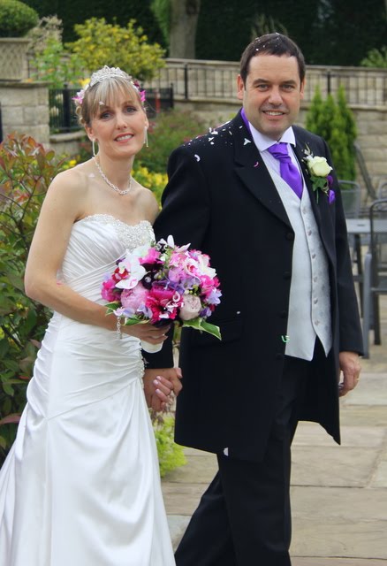 Susan's confetti drenched wedding bouquet included deep pink and pale pink