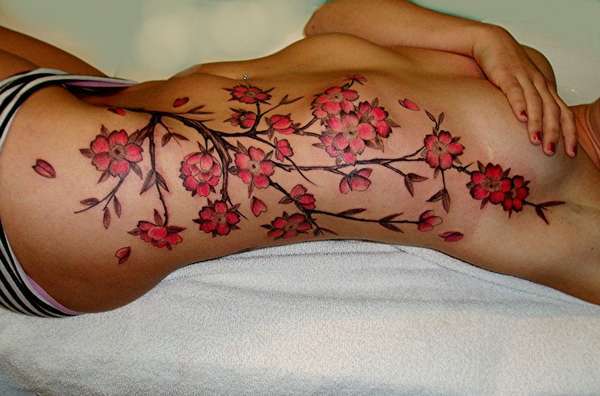 Girls adore the look and sensual beauty of cherry blossoms tattoos 