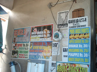 posters offering various juices