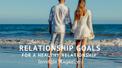 couple walking on beach, Inveigle Magazine
