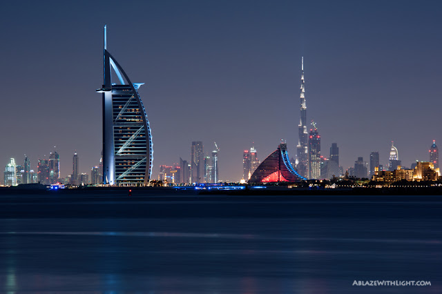 Photo of Burj Al Arab hotel and Burj Khalifa in the background as seen from the palm island