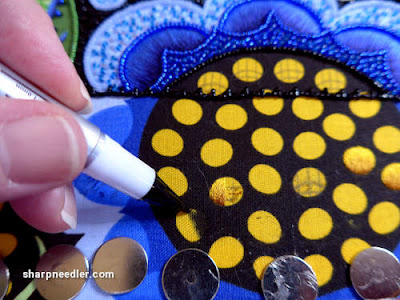 Japanese Bead Embroidery Project Wild Child: Testing a fabric marker in order to make little gold discs at the bottom of the project disappear. (Wild Child Japanese Bead Embroidery by Mary Alice Sinton)