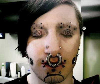Star Tattoo Face Girl. Weird Face Tattoos; girl star