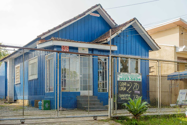 Uma casa de madeira chamada “Vila América”