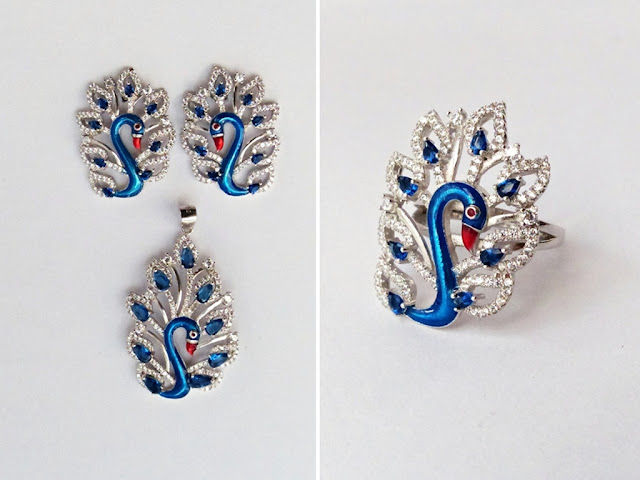 Silver peacock jewelry set: earrings, pendant and ring