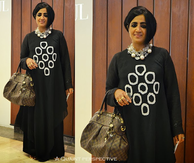 Manali goes for bold circular graphics on the dress and teams it with big pearls around her neck that sit well together.