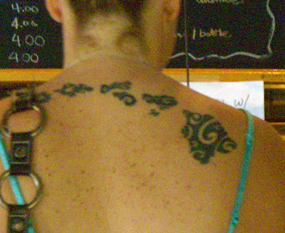 hawaiian island tattoos. I spotted a girl recently standing in line with the 