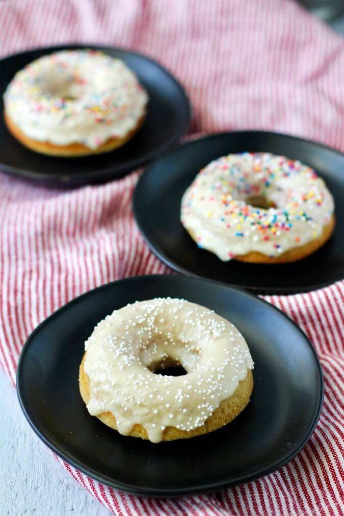 Nutmeg Custard Cake donuts on plates