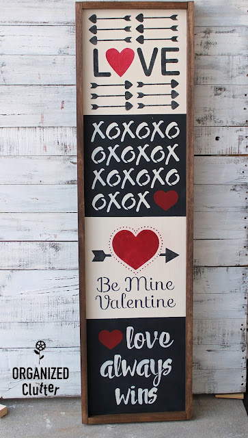 Photo of a Valentine's Day stenciled collage sign.