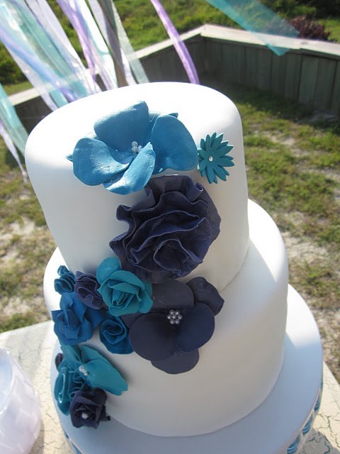 Blue Gumpaste Flowers A beautiful white wedding cake 