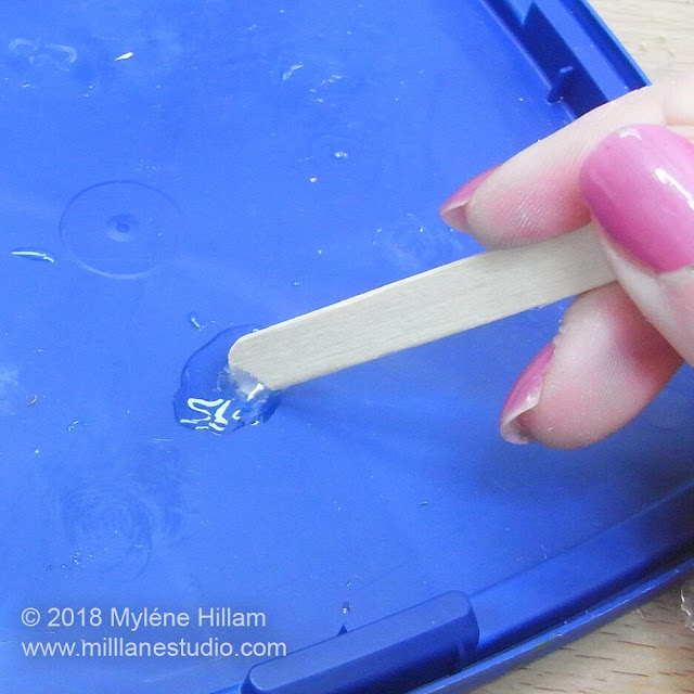 Mixing the 5-minute epoxy with a paddle pop stick