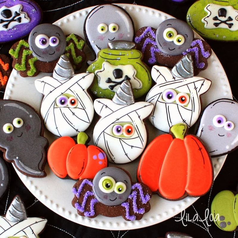 Decorated Halloween sugar cookies - unicorn mummies, potion bottles, spiders, pumpkins and ghosts