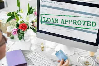 Businessperson shaking hands after fast loan approval