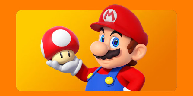 Imagem de Mario segurando um cogumelo.