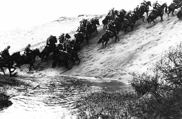 In 1939, the Polish army still maintained many cavalry squadrons, which had served them well as recently as the Polish-Soviet War in 1921. A myth emerged about the Polish cavalry leading desperate charges against the tanks of the invading Nazis, pitting horsemen against armored vehicles. While cavalry units did encounter armored divisions on occasion, their targets were ground infantry, and their charges were often effective. Nazi and Soviet propaganda helped fuel the myth of the noble-yet-backward Polish cavalry. This photo is of a Polish cavalry squadron on maneuvers somewhere in Poland, on April 29, 1939.