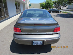 Paint peeling on trunk before getting new car paint at Almost Everything Auto Body.