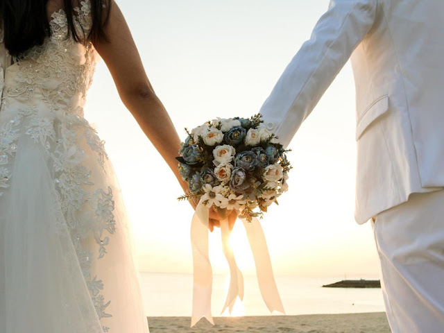 Couple Holding Hand Celebrate First Year of Marriage