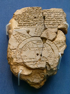 A clay tablet incised with a diagram of the known world, dated c. C5th BC