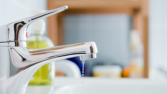 A leaky bathroom faucet can waste gallons of water every day.