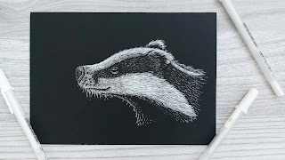 realistic drawing of a badger using sakura white gelly roll pens on black paper