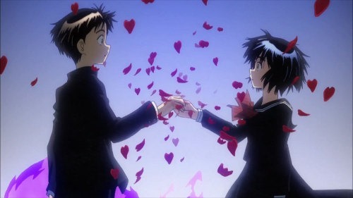 Tsubaki and Urabe the two lead characters clasp hands opposite another as red petals burst forth around them