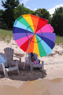 chair and rainbow beach umbrella2