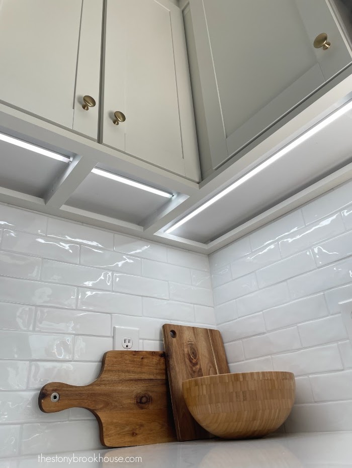 Under cabinet LED light strip in corner
