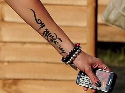 women arm tattoos