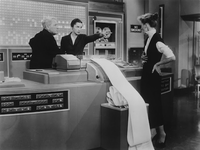 Black and white still photograph from the 1957 film, 'Desk Set'