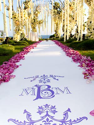 Scripted calligraphy custom monograms and classic wedding cakes embody 