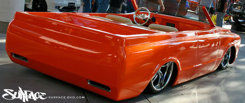 Beautiful clean and shaved orange Chevy C10 from the 2009 SEMA show